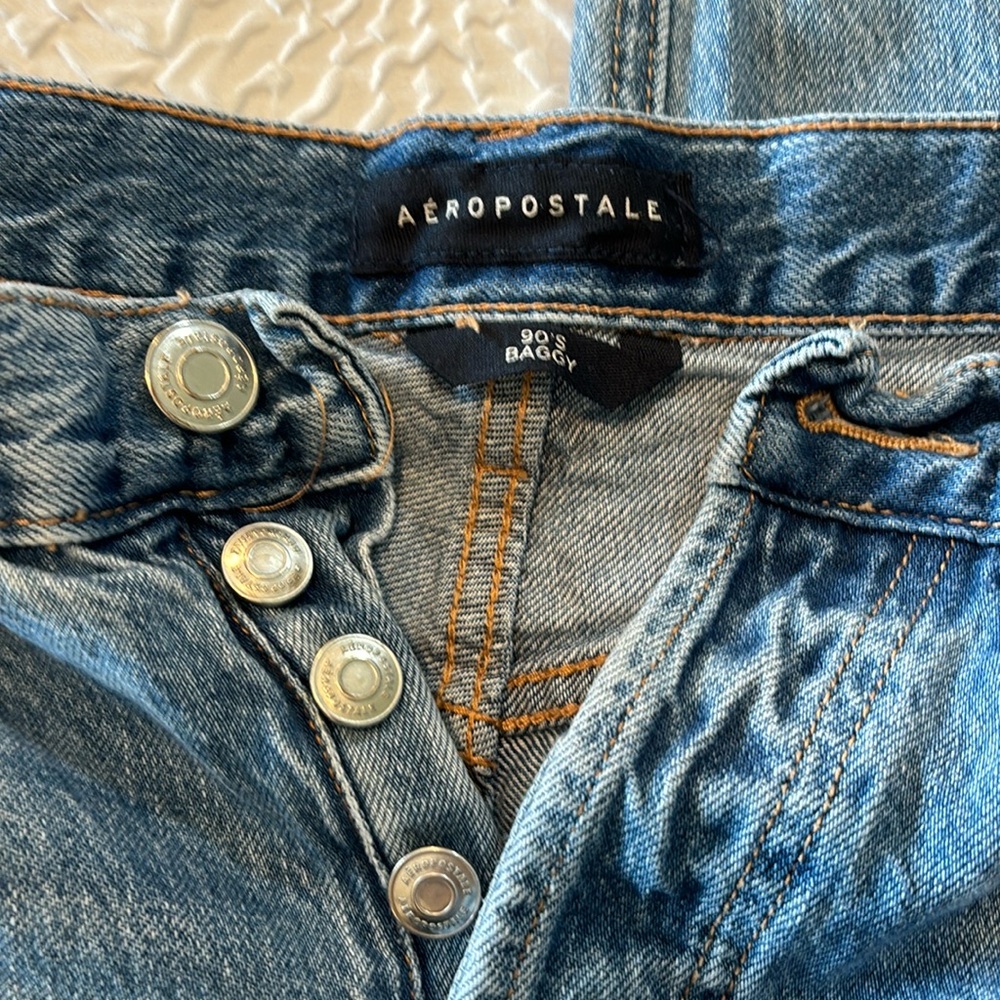 Ripped blue denim